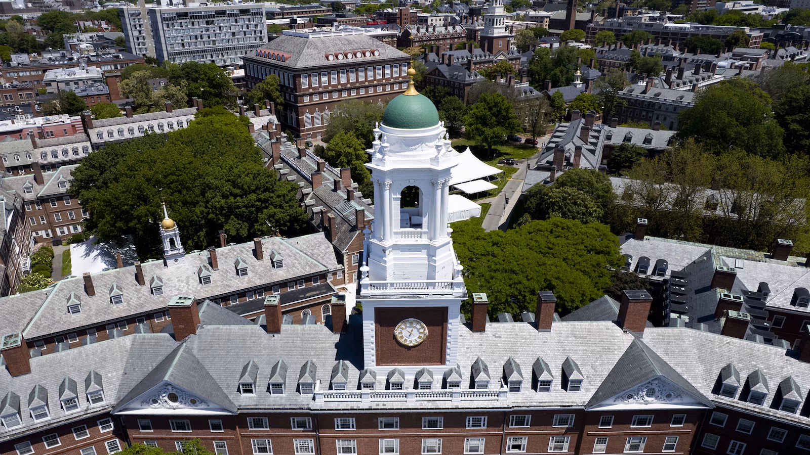 Trump escalates conflict with Harvard over funding and admissions policies
