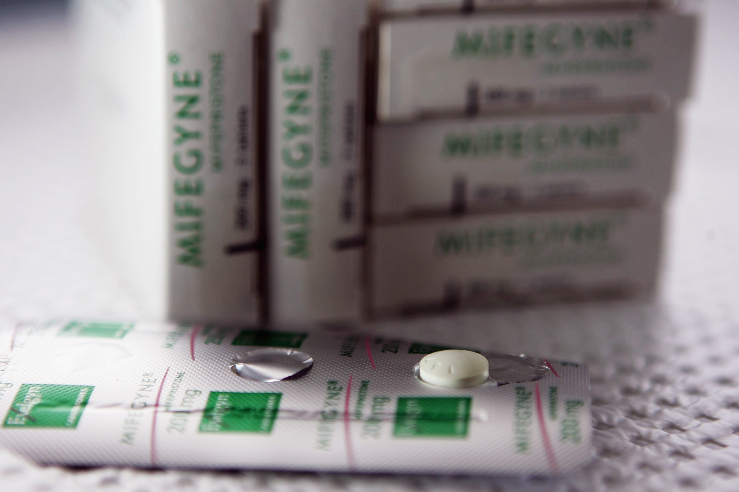 Appeals court limits access to abortion pill, but keeps it on the market.