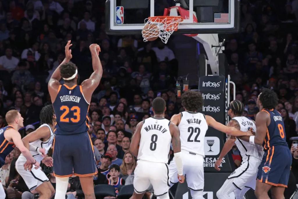 Featured image for "Robinson's Free Throws Lift Knicks Over Nets in 111-107 Victory"