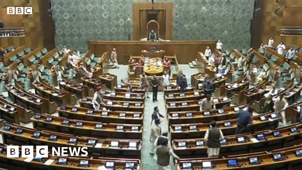 Security Scare in Indian Parliament: Intruder Jumps on Desks