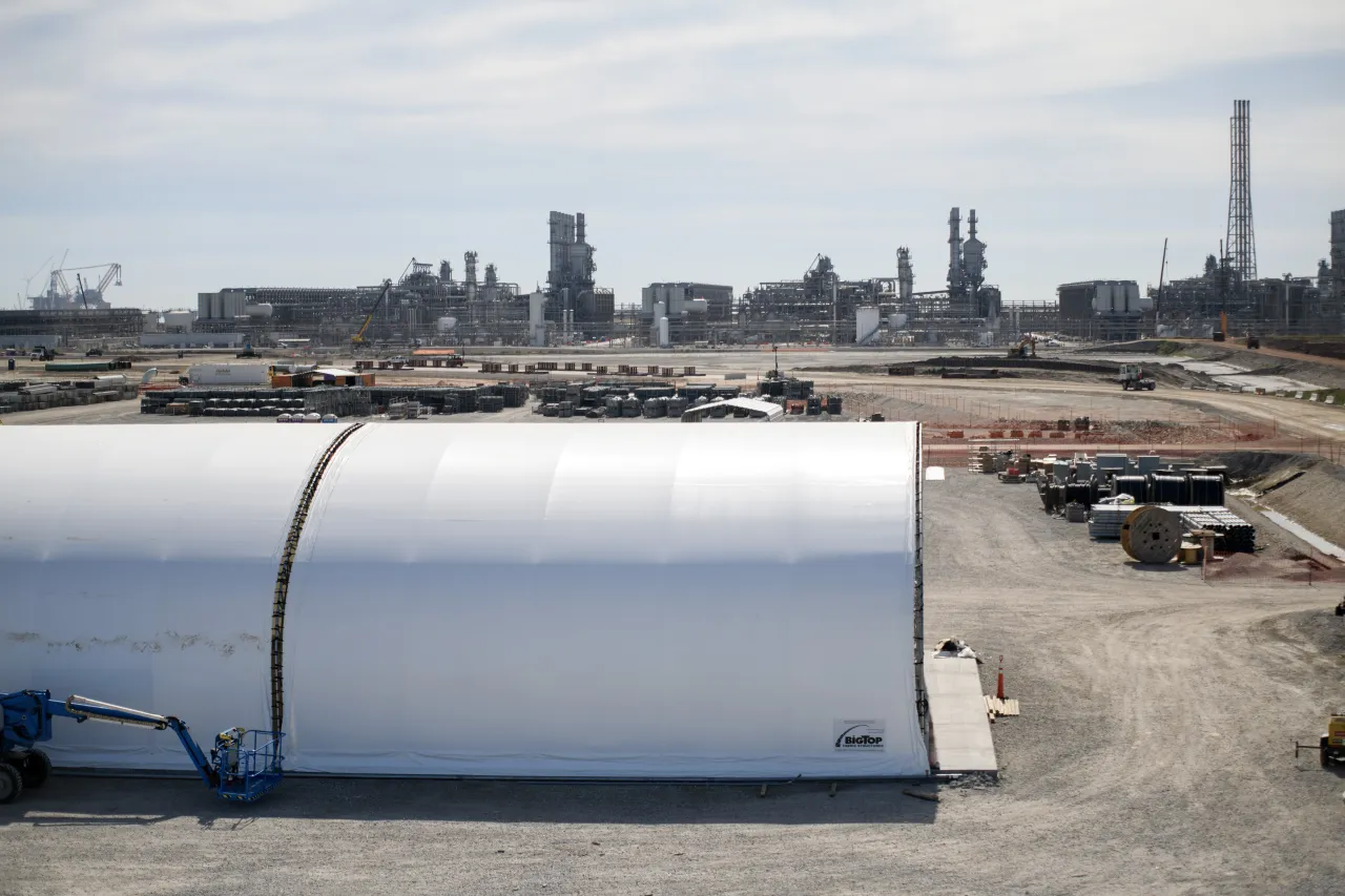 Featured image for "Biden's LNG Policy Sparks Controversy and Environmental Victory"