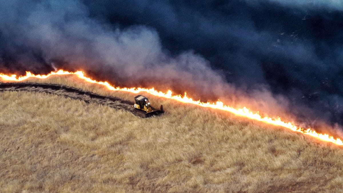 "Corral Fire Rages in California, Forces Evacuations Amid Heatwave"