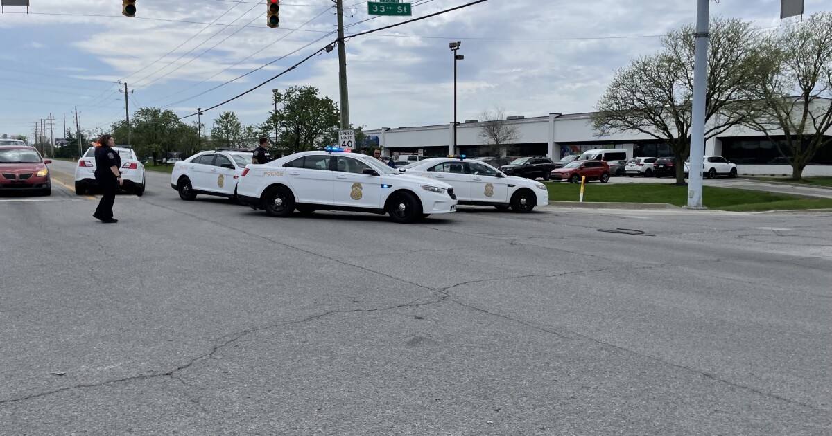Two IMPD officers injured in high-speed pursuit shooting.
