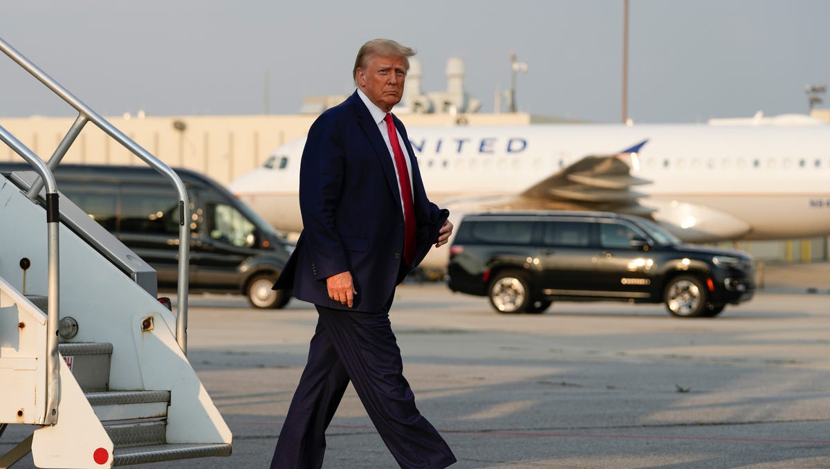 "Unraveling the Truth: Donald Trump's Arrest and Indictments - Is He Behind Bars?"