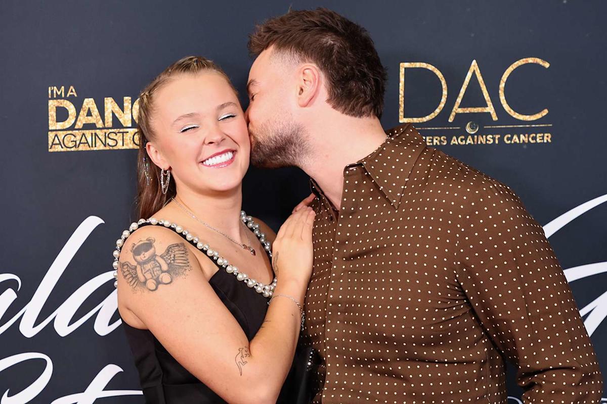 Featured image for JoJo Siwa and Chris Hughes Make PDA-Filled Red Carpet Debut at Beverly Hills Gala