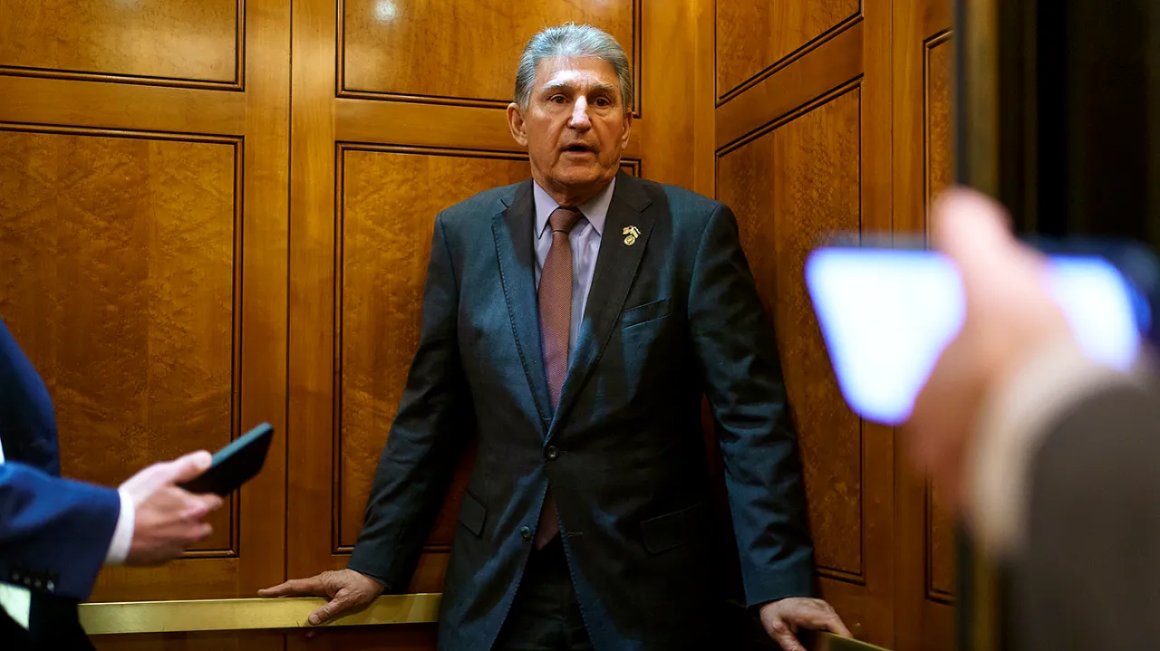 Manchin's Threat to Sue Biden Administration Over EV Tax Credits Causes Controversy.