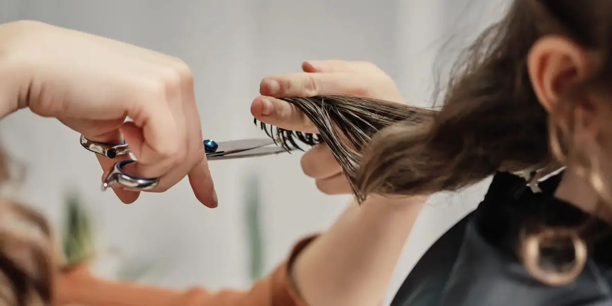 Featured image for "Viral DMs lead to hairstylist's job loss"