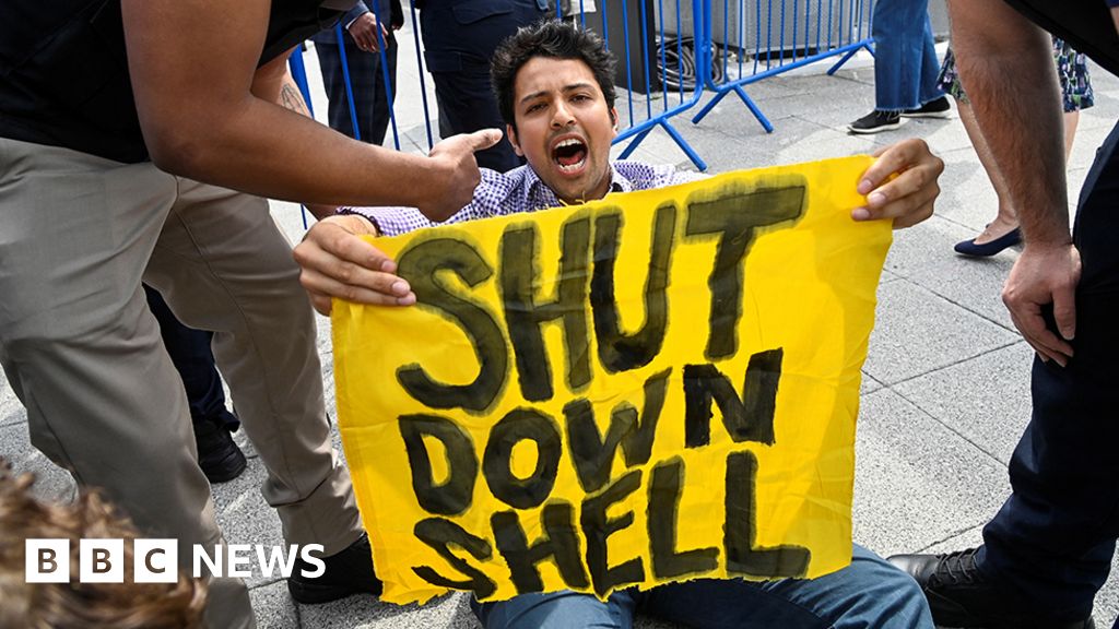Climate activists disrupt Shell AGM with protests.