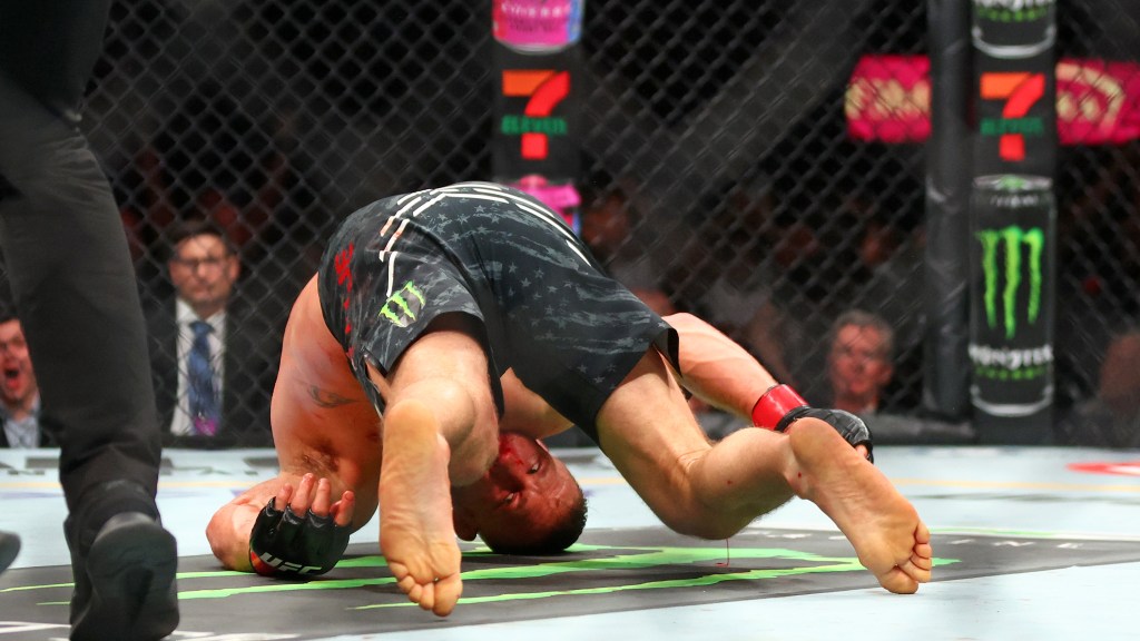 Featured image for "Max Holloway's Epic Last-Second KO: The Defining Moment of UFC 300"