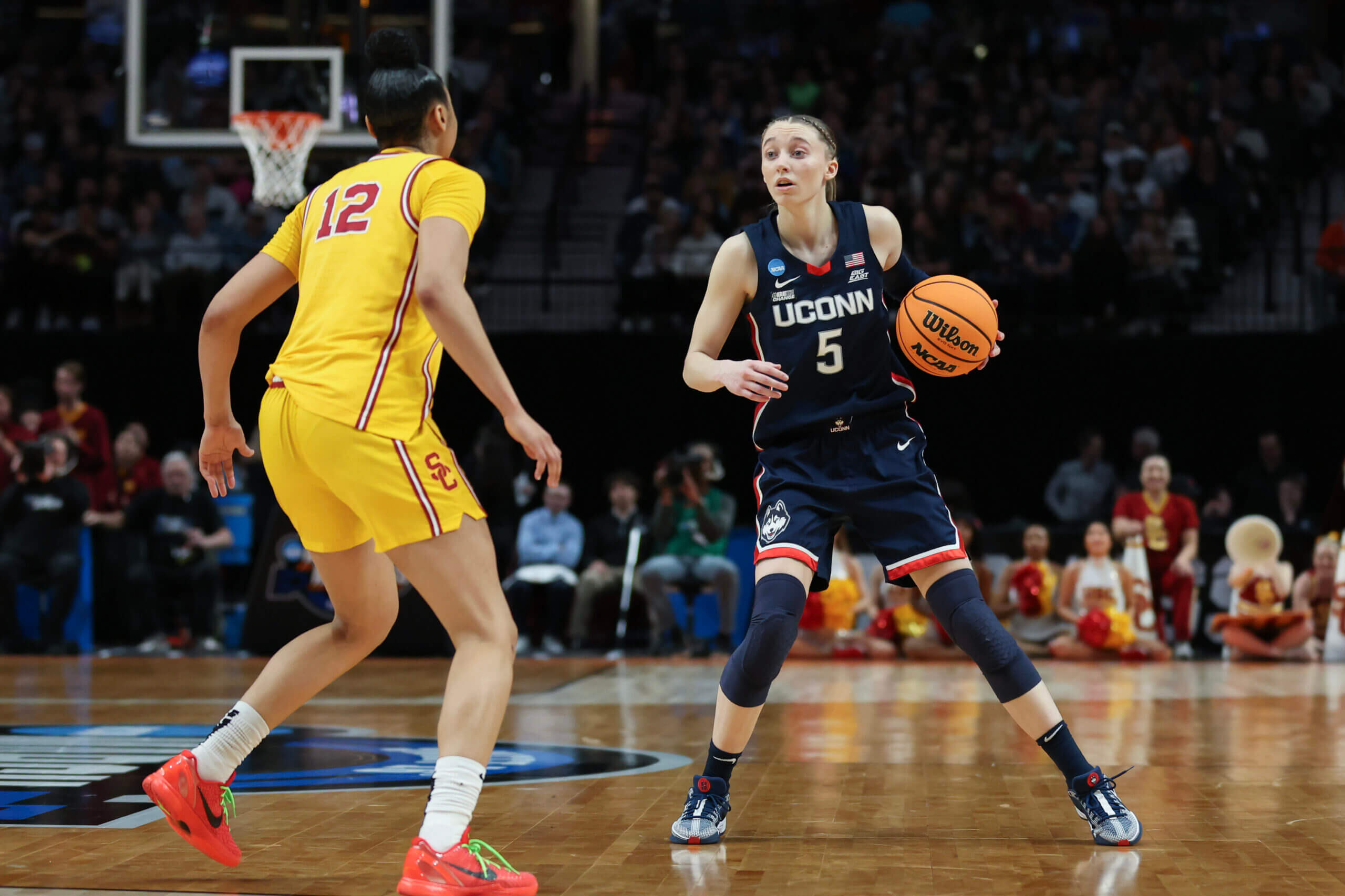 "UConn and Iowa Advance to Final Four in Women's NCAA Tournament"