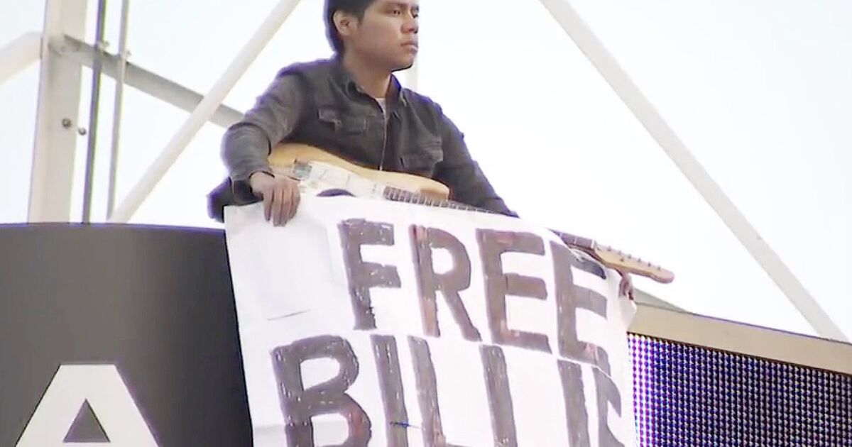 Featured image for Man climbs KTLA tower in Hollywood demanding 'Free Billie Eilish'