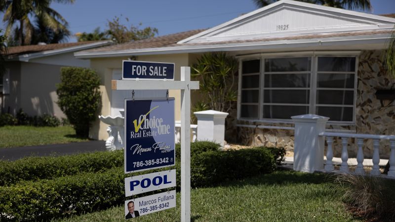 Mortgage rates fluctuate, dip slightly after recent climb.