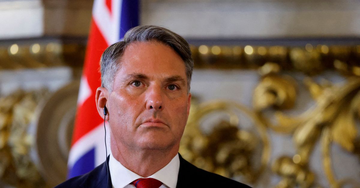 Australia denies promise to support US in Taiwan conflict over submarine deal.