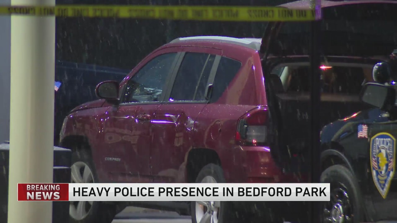 Officer Shot at Gas Station in Bedford Park: Investigation Underway