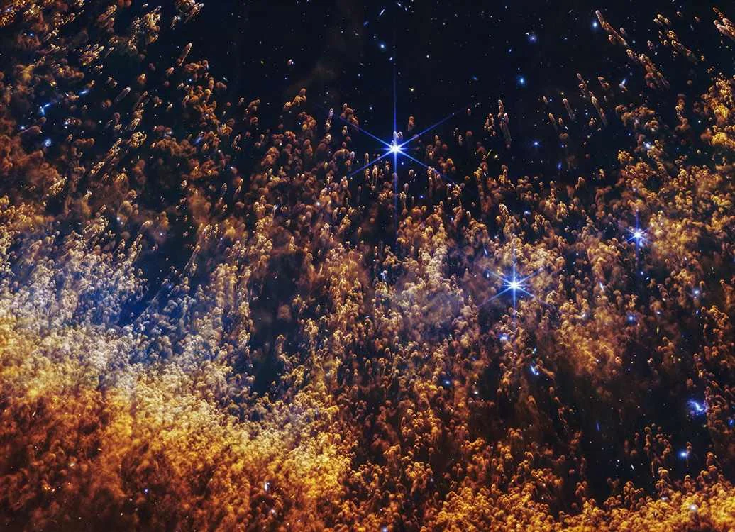 Webb Telescope Captures Star’s Final Breath as Smoky Columns in Helix Nebula