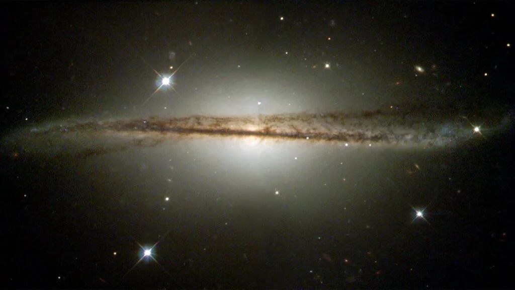 "Dark Matter's Role in Warping the Milky Way Revealed"