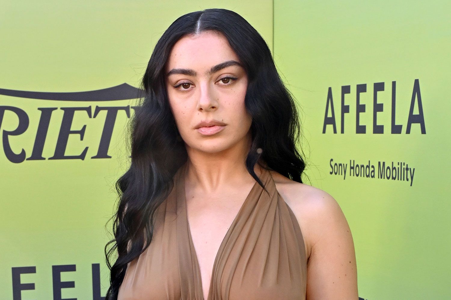 Charli XCX Embraces Bold Fashion with Daring Red Carpet Look