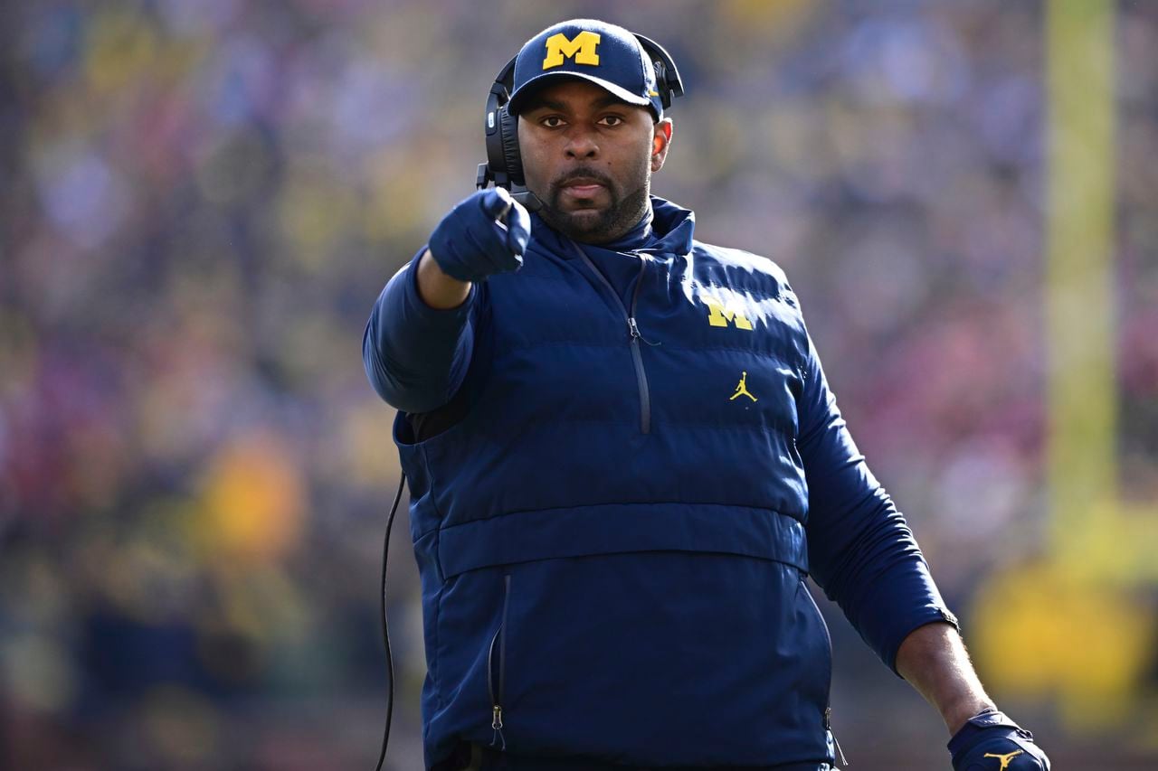 "Michigan Football Promotes Analyst to Special Teams Coordinator and QB Coach to Offensive Coordinator Under Sherrone Moore"