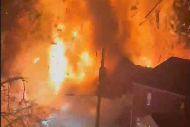 Featured image for "Virginia House Explodes During Police Search for Suspect Firing Flare Gun"