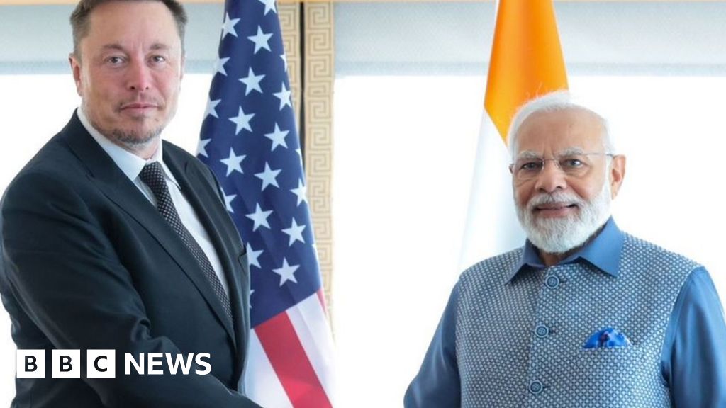 Tesla CEO Elon Musk pledges to bring company to India during meeting with PM Modi.