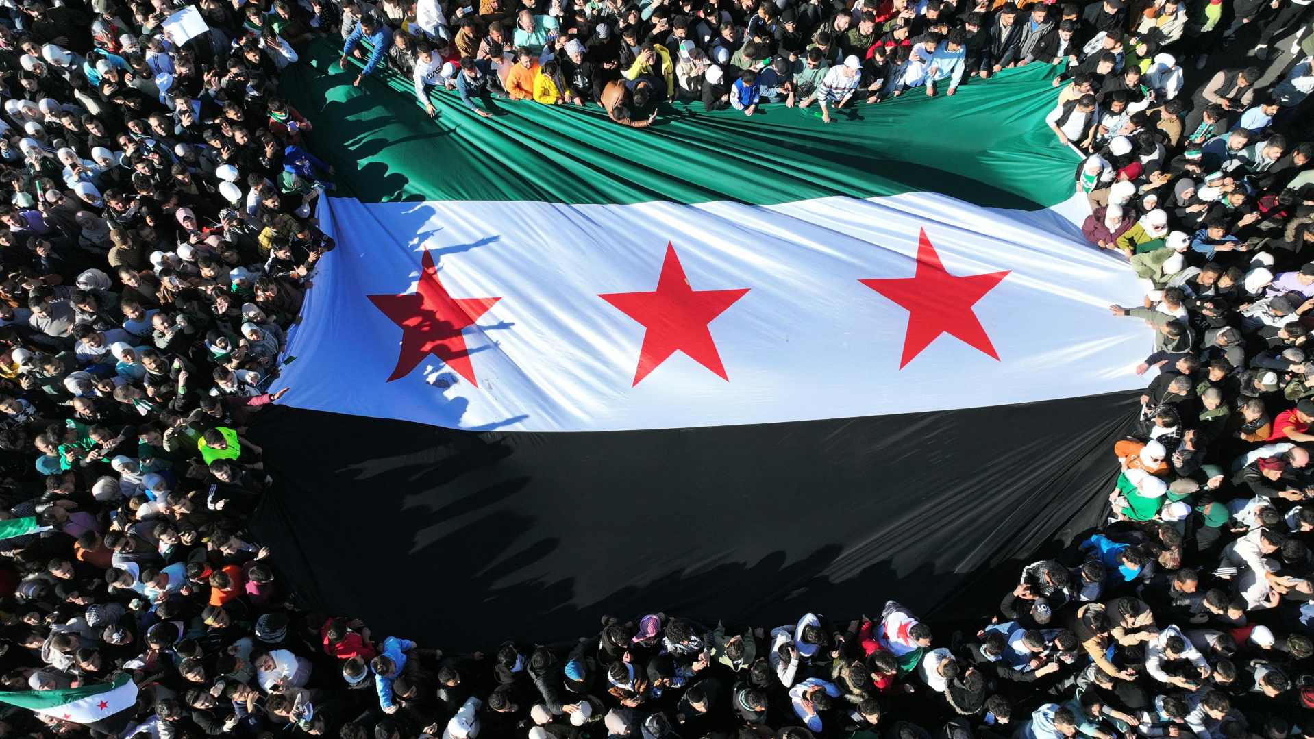 Featured image for Syria Marks New Era as Assad Departs Amid Celebrations