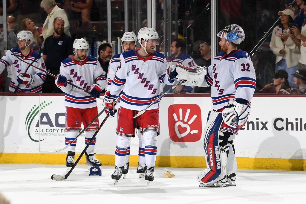 Featured image for "Record-Breaking Performances: Lafreniere's Hat Trick and Quick's Wins Propel Rangers"