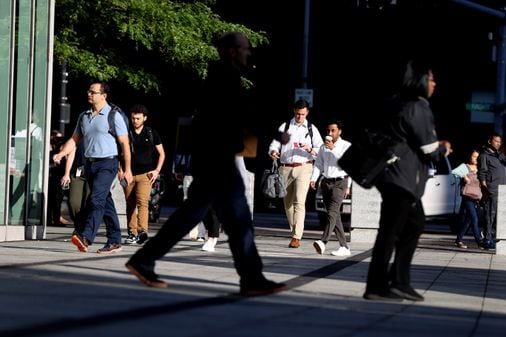 Featured image for "Financial Giants Tighten Return-to-Office Mandates for Hybrid Workers"