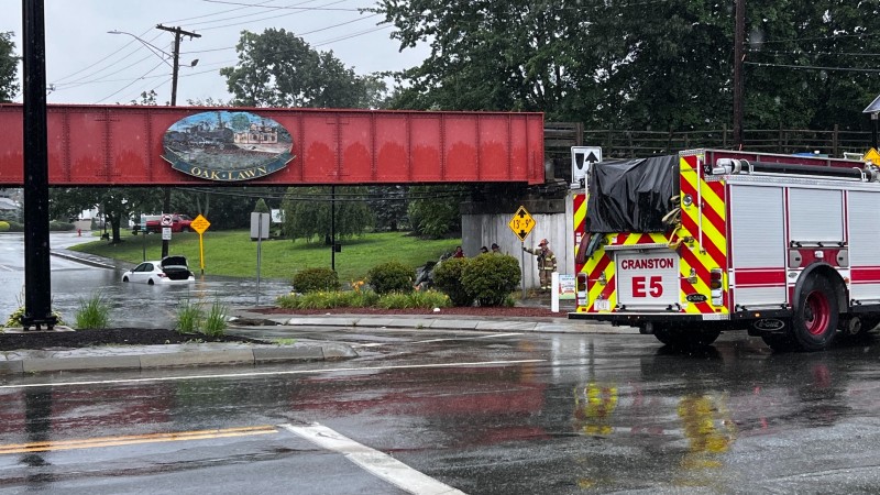 "Devastating Floods Sweep Through Rhode Island and Massachusetts Due to Heavy Rainfall"