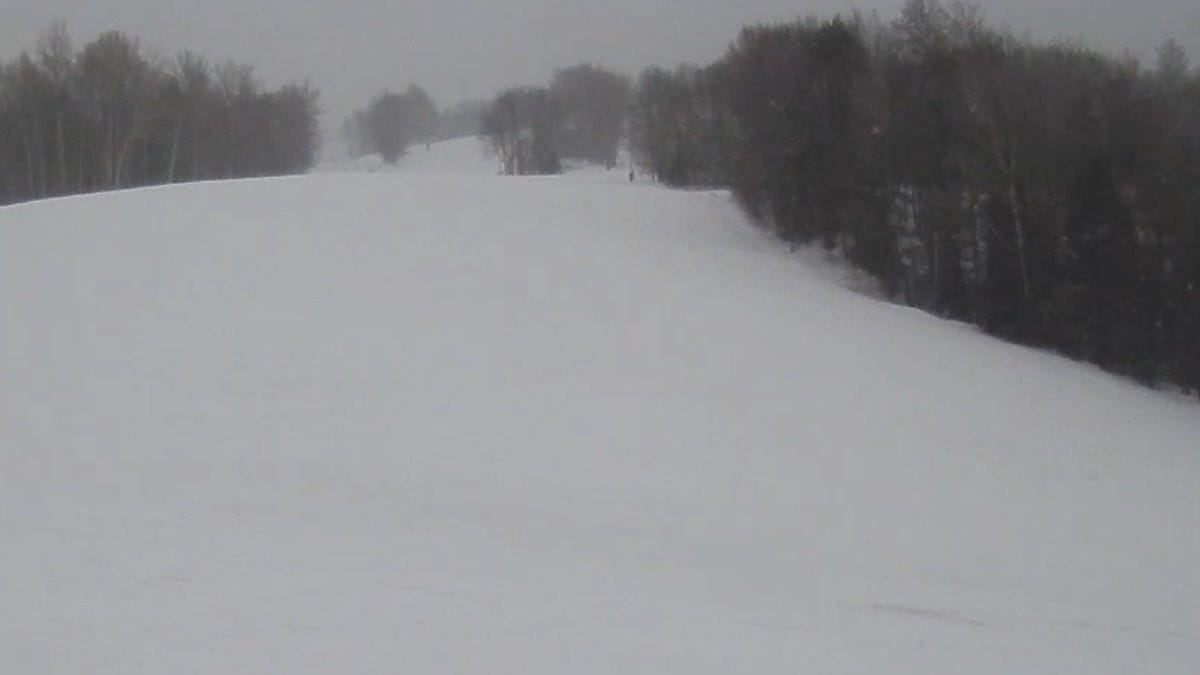 Featured image for "Northern Michigan Braces for 2-Foot Blizzard in Spring Snowstorm"