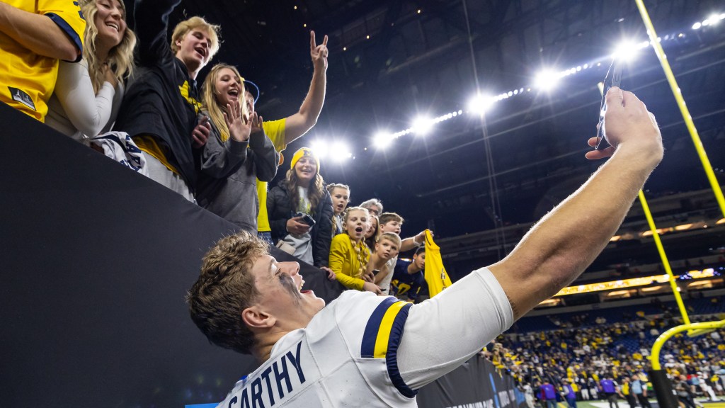 "2024 NFL Draft: Quarterback Trades and Surprising Slides in Mock Draft Scenarios"