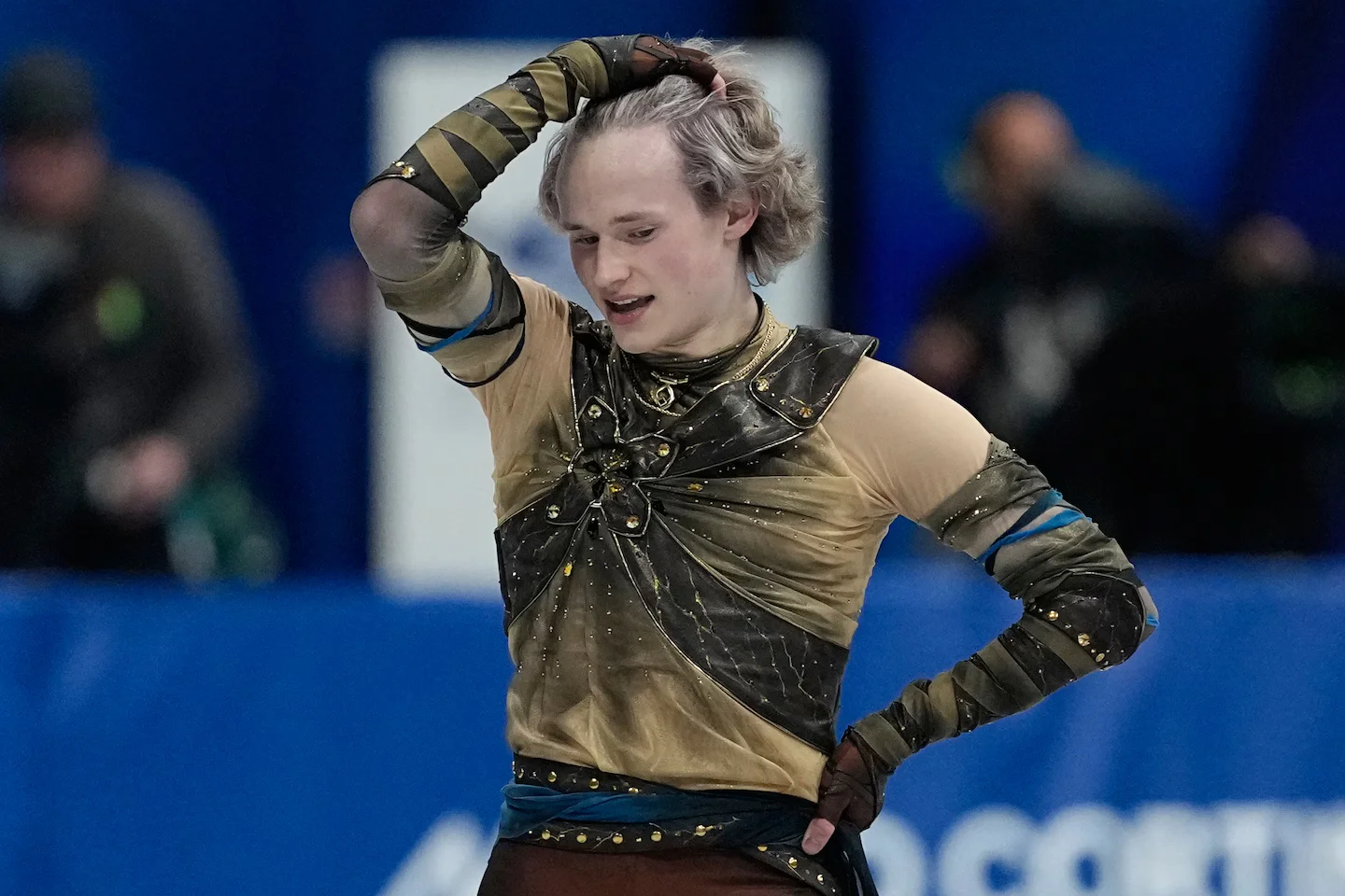 Malinin stumbles in Olympic debut, takes silver in team skate