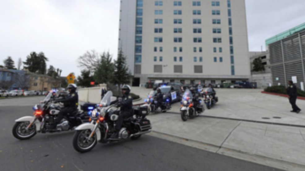 "Tragedy Strikes as Oakland Officer Fatally Shot at Dispensary, Suspect at Large"