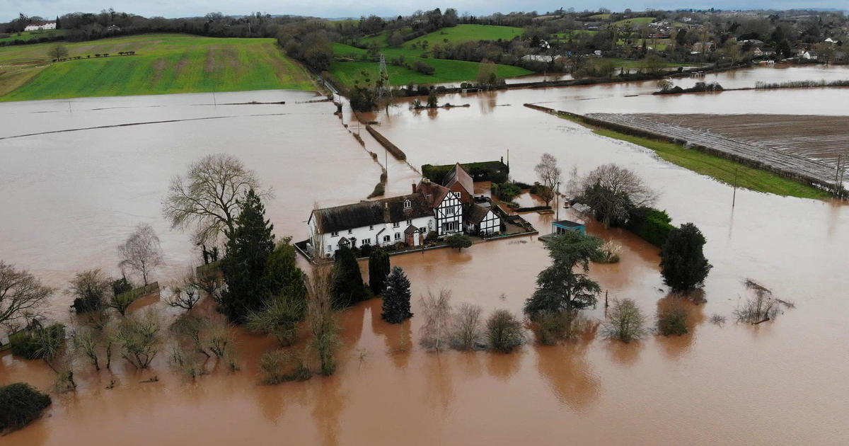 Featured image for "English Couple Constructs Defensive Wall Against Persistent Home Flooding"