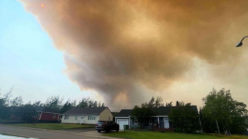 Featured image for "Mass Evacuations as Aggressive Wildfire Rages in Eastern Canada"