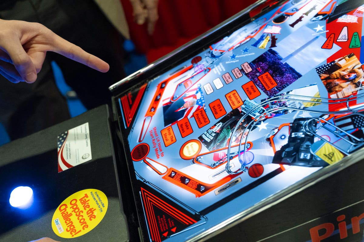 "CPAC 2024: Maga Republicans Play Jan 6 Themed Pinball Amid Trump Focus"