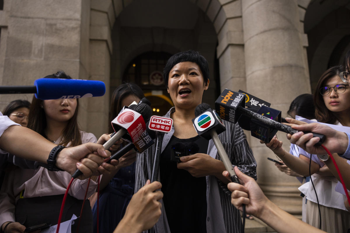 Hong Kong journalist wins rare court ruling for media freedom.