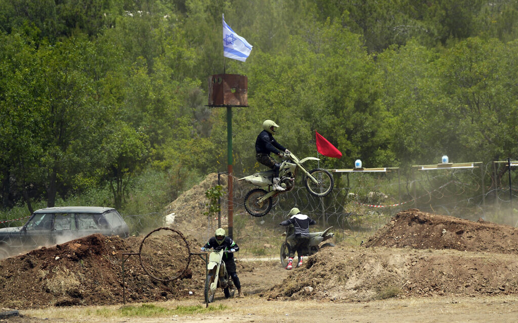 Hezbollah conducts simulated war with Israel in south Lebanon for reporters.