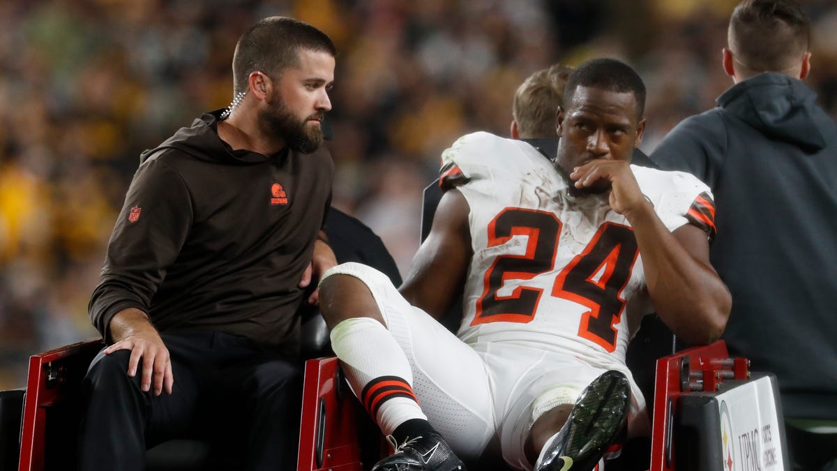 "Nick Chubb's Season-Ending Knee Injury Sparks Controversy and Support"