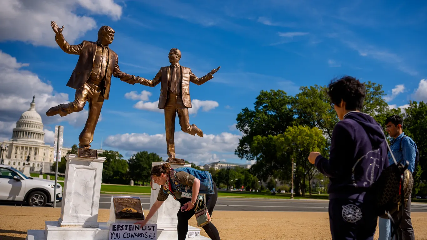 Featured image for Trump and Epstein Hand-in-Hand Statue Returns to D.C.'s National Mall