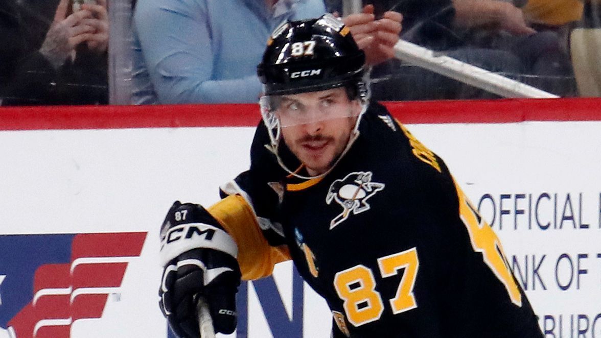 Featured image for "Crosby's 1,000 Assists Propel Penguins to Victory, Raymond's Hat Trick Earns Wings a Point"