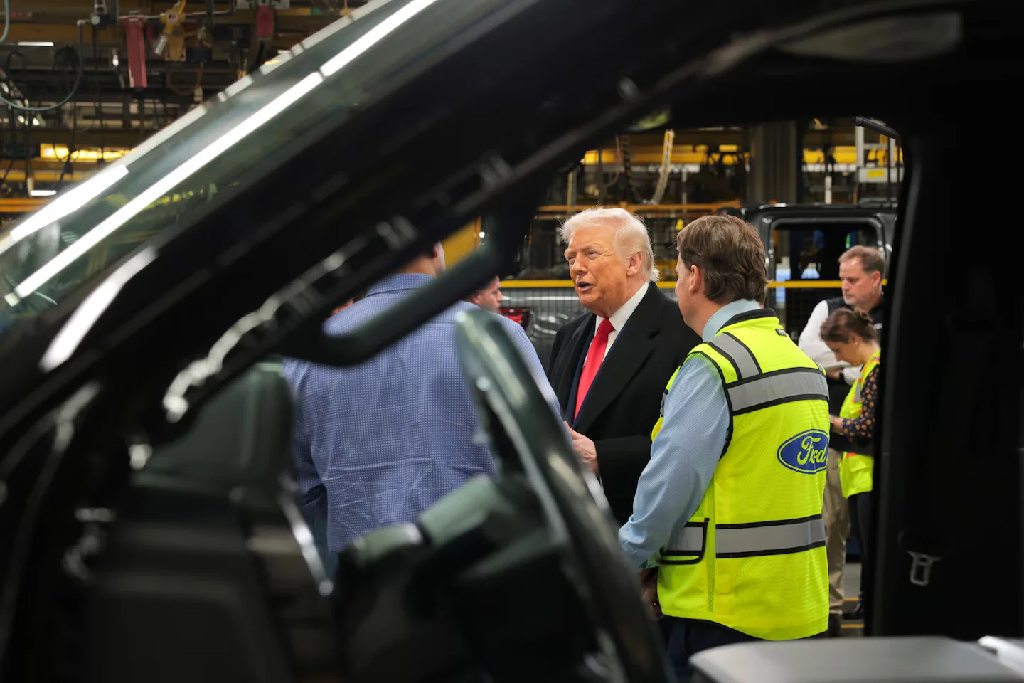 Trump cusses at Detroit Ford plant heckler, raises middle finger