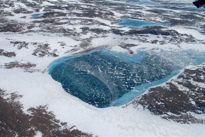 Polar Ice Melt: Greenland Accelerates, Antarctica Slows