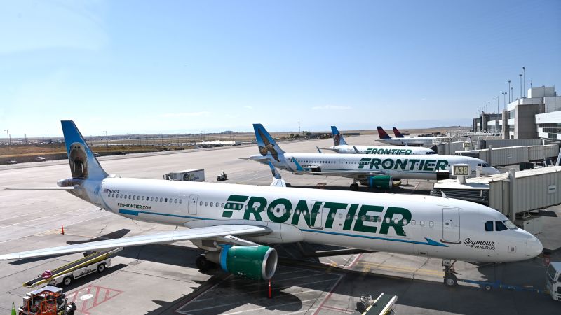 Frontier Airlines passenger arrested for hitting flight attendant with intercom phone.