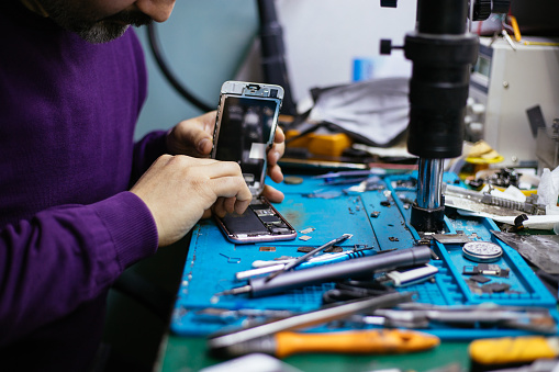 Featured image for "Apple Embraces Used Parts for iPhone Repairs, Finally"