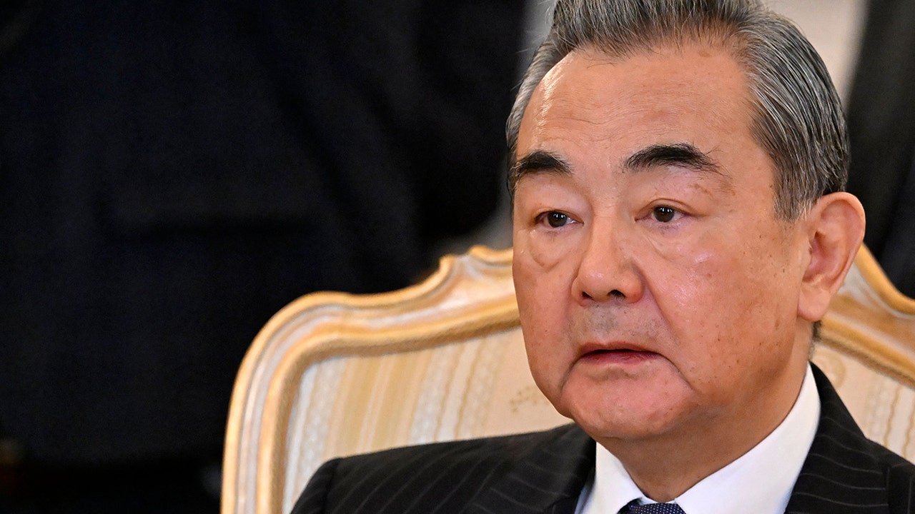 China seeks Germany's support for peaceful reunification with Taiwan amidst rising tensions.