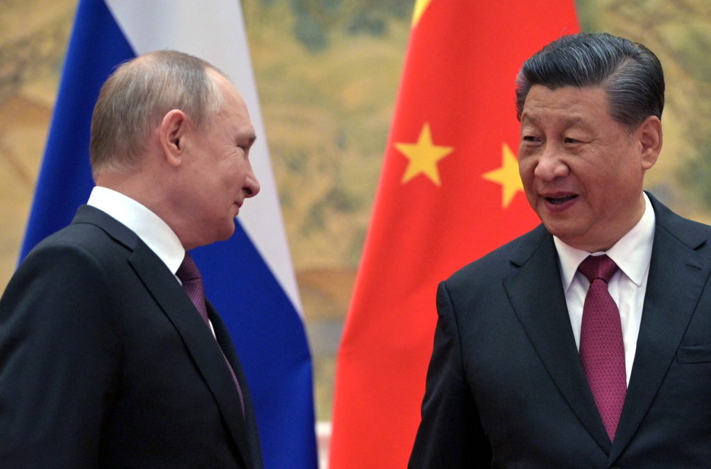 "International tensions rise as China's Xi visits Putin amid Putin's arrest warrant"