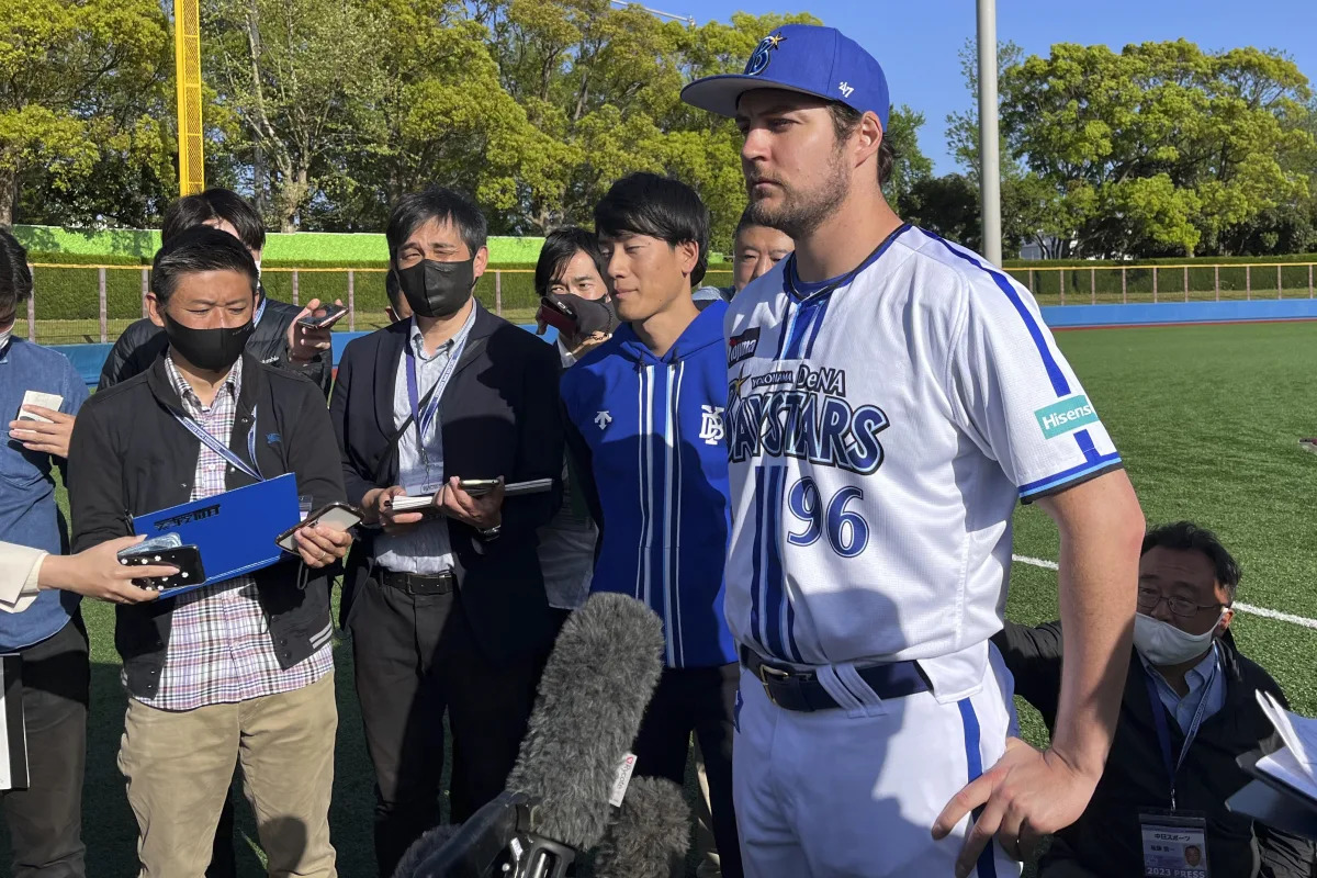 Trevor Bauer debuts in Japanese baseball after MLB shunning.