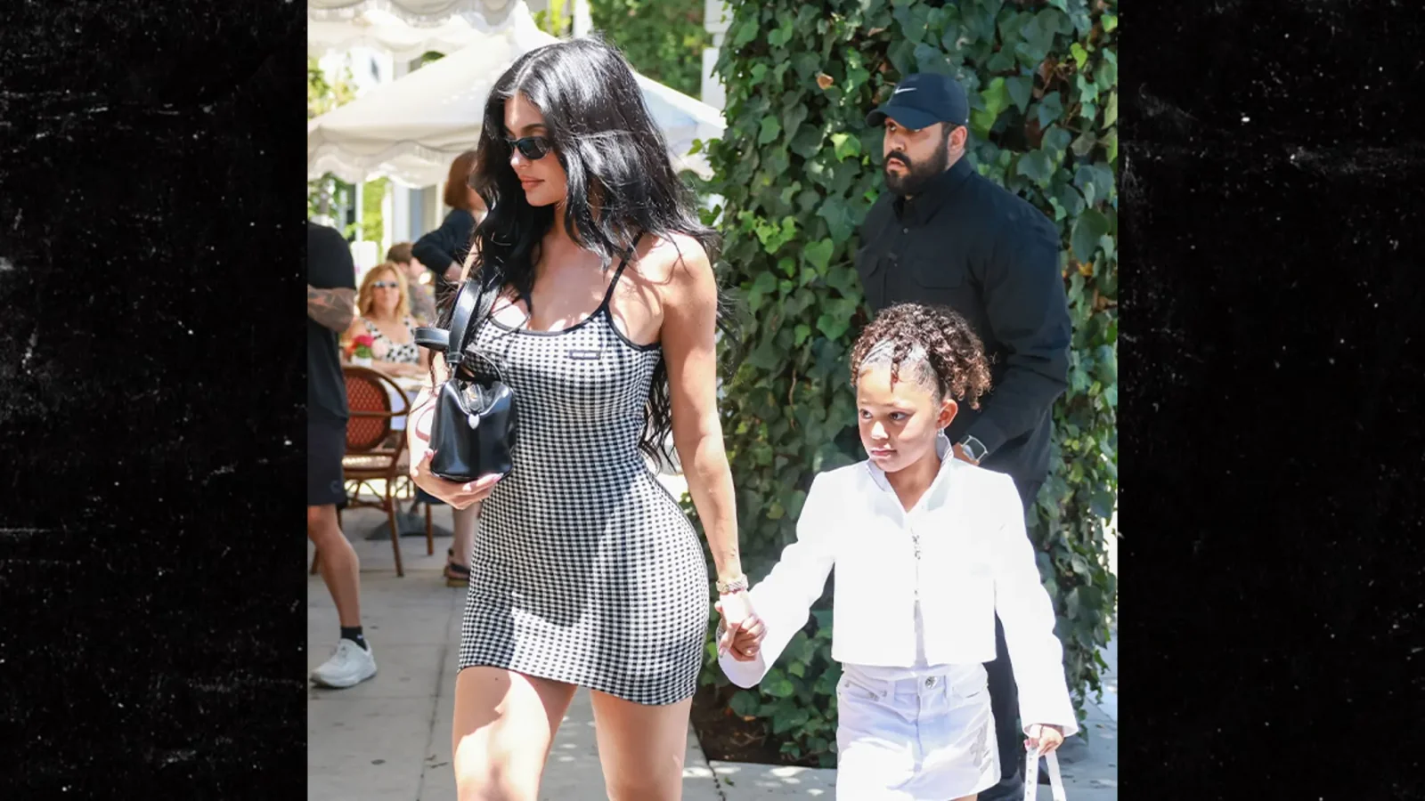 Kylie Jenner and Stormi Share a Hand-Holding Moment en Route to Birthday Bash