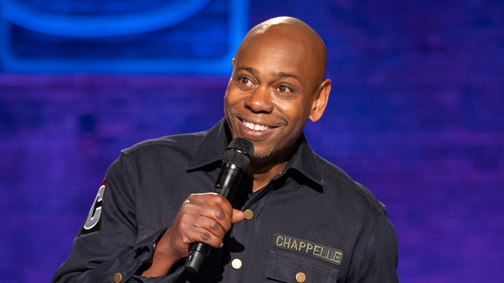 Featured image for "Dave Chappelle's 'The Dreamer' Netflix Special Sparks Controversy with Trans and Disabled Jokes"