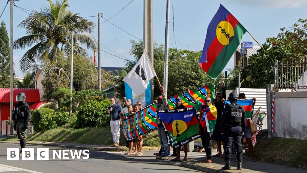 Featured image for Macron Halts New Caledonia Voting Reform Amid Riots and Evacuations